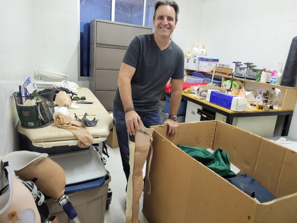 Steve opening the box and seeing all the donated supplies