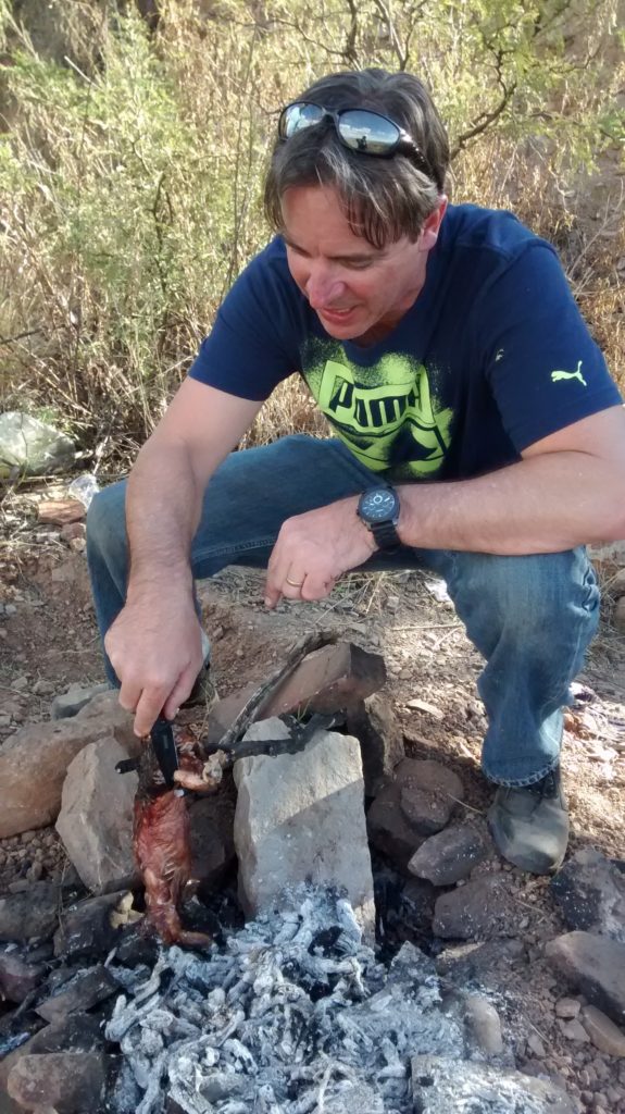 Steve cooking the viscacha